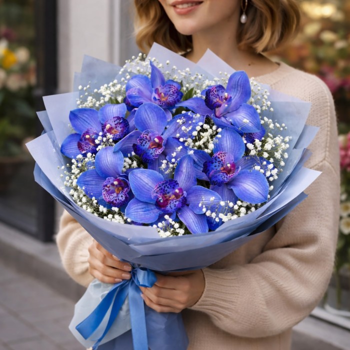 Букет 7 синих орхидей