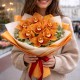 Букет 9 оранжевых орхидей